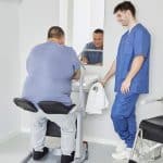 Molift Transfer Pro Sit to Stand Aid someone seated in it